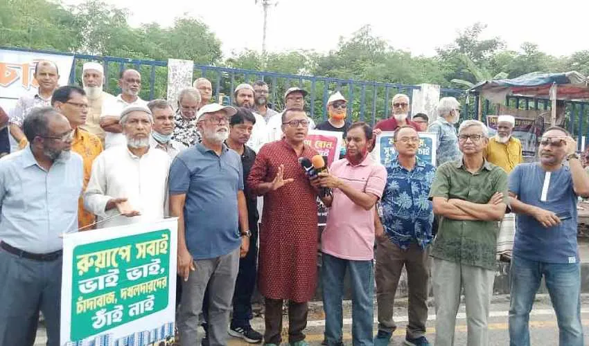 উত্তরায় রাজউকের আবাসন প্রকল্পে সুষ্ঠু আবাসিক পরিবেশ নিশ্চিতের দাবিতে বাসিন্দাদের মানববন্ধন