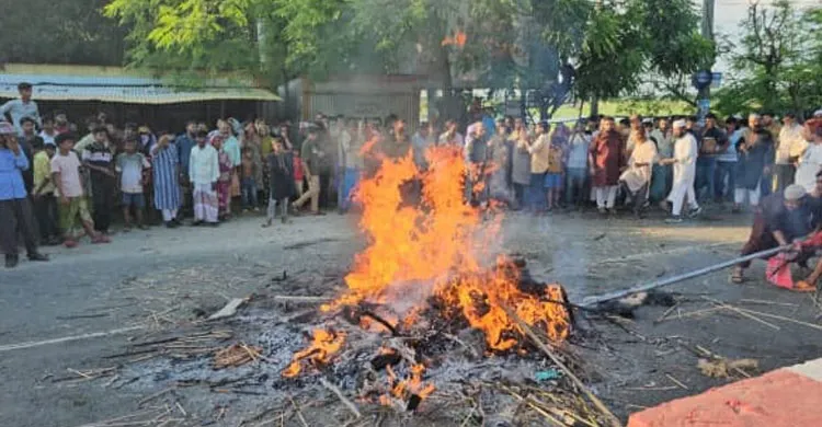 রাজবাড়ীতে নুরাল পাগলার মরদেহ কবর থেকে তুলে অগ্নিসংযোগ